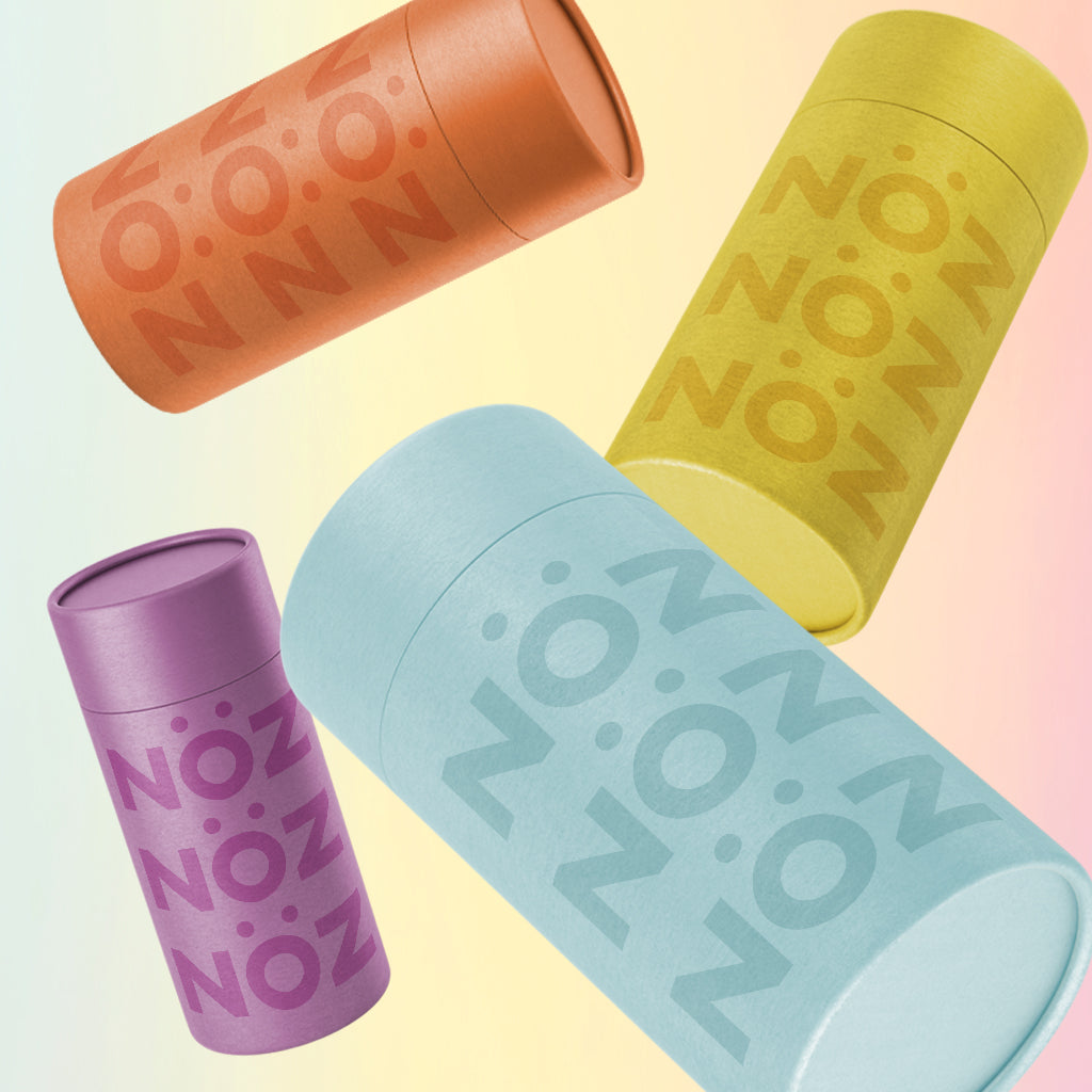 Angled assorted variety of Noz's sunscreen color selection